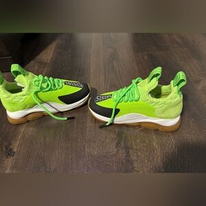 Pre owed lime green Versace sneakers in excellent condition.